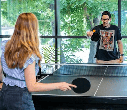 team playing ping pong